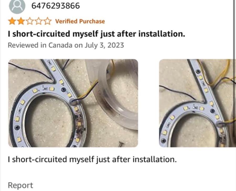 Amazon 2-star review of house number sign — buyer writes: I short-circuited myself just after installation. Shows exposed LED strip with bare wires.