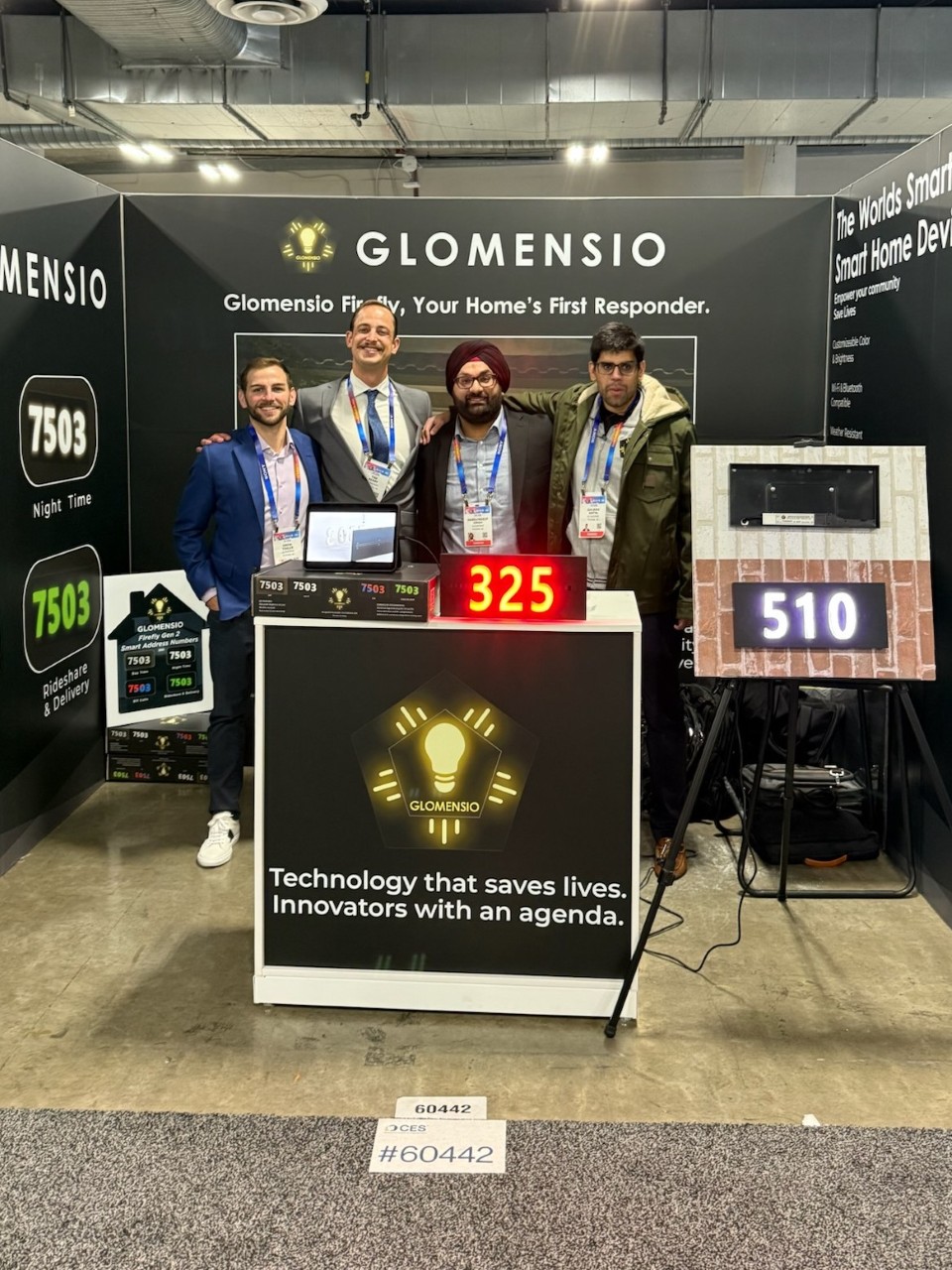 Multiple Glomensio Firefly units displaying different house numbers — 7503, 325, 510 — one product, any address, configured in minutes
